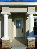 Exterior concrete block walls with stucco finish, decorative features and doors per plans - click to open larger image in new window